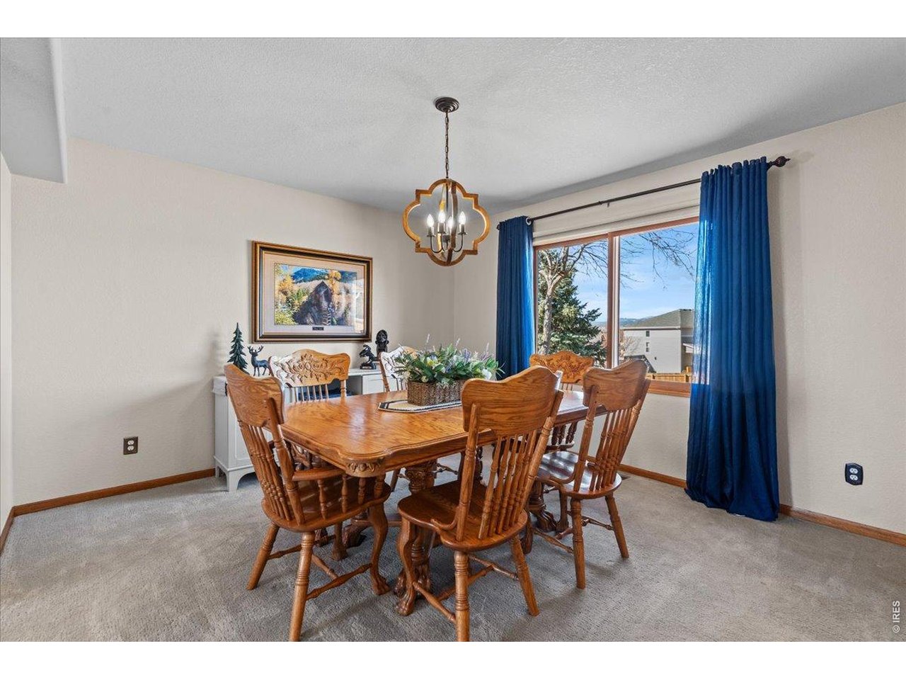 537 South 9th Street Berthoud, CO 80513 - Photo 9 of 47 a dining room with furniture window wooden floor