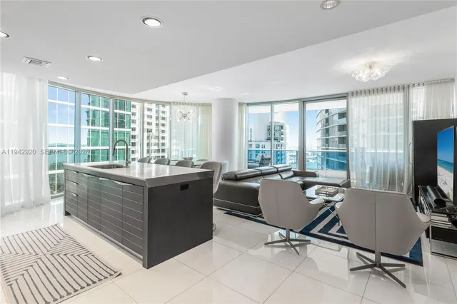 a view of workspace with wooden floor and furniture
