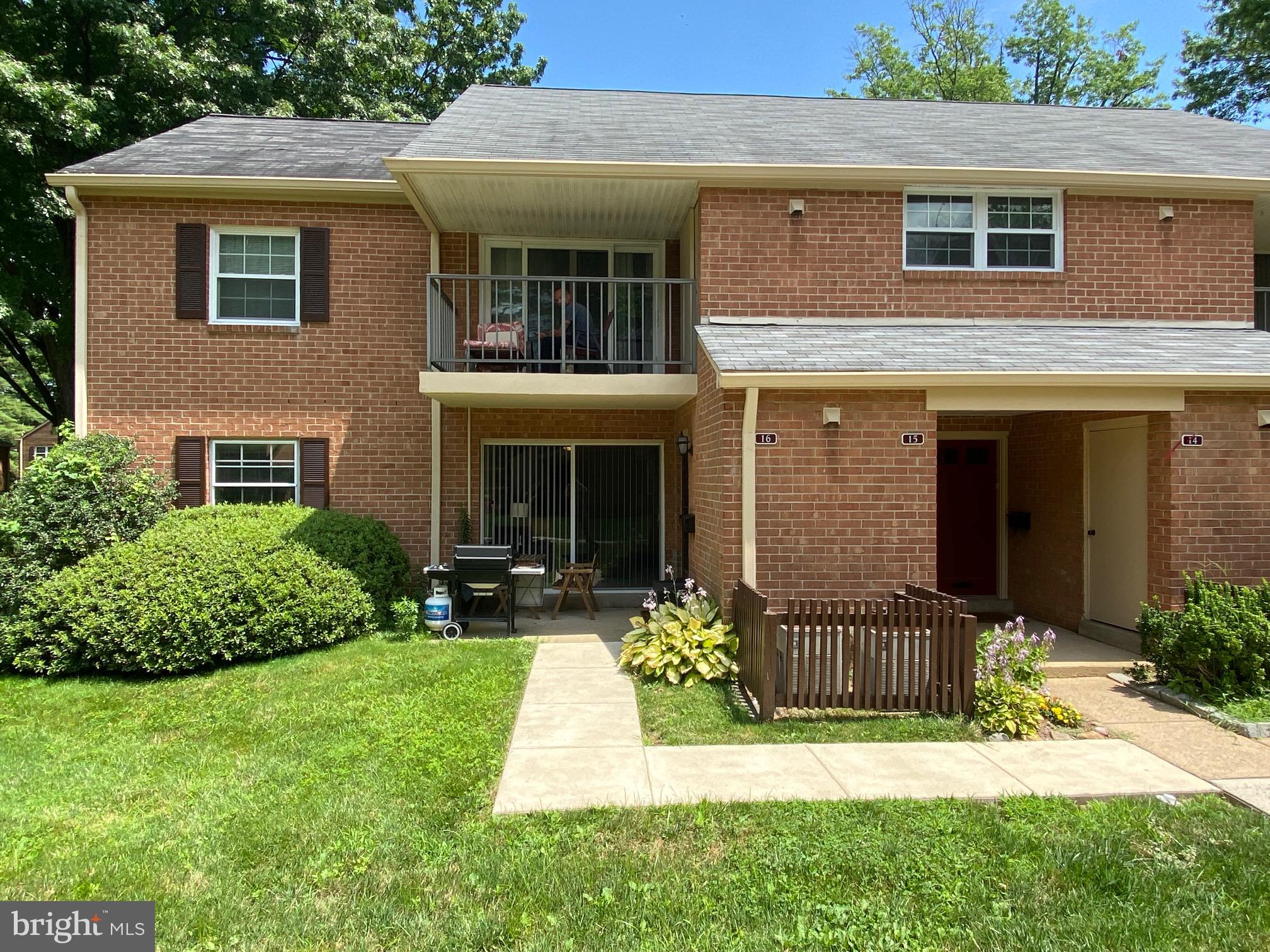 16 Old Forge Crossing, Unit 16 Devon, PA 19333 - Photo 1 of 12 front view of a house with a yard