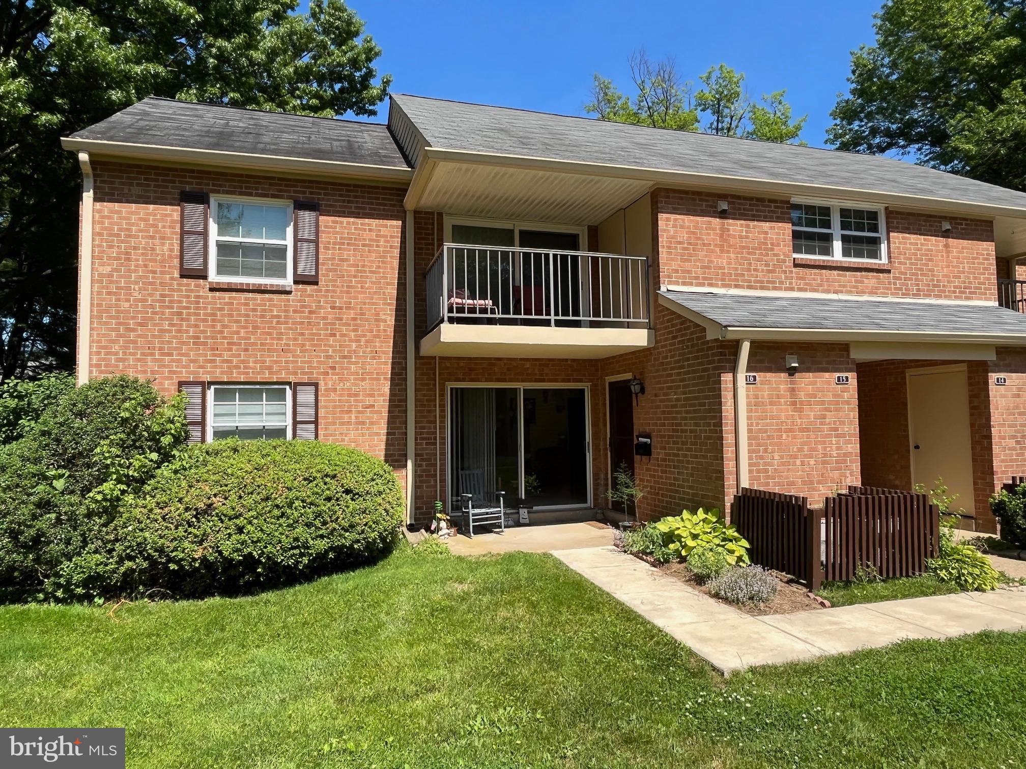 16 Old Forge Crossing, Unit 16 Devon, PA 19333 - Photo 2 of 12 a front view of a house with a yard