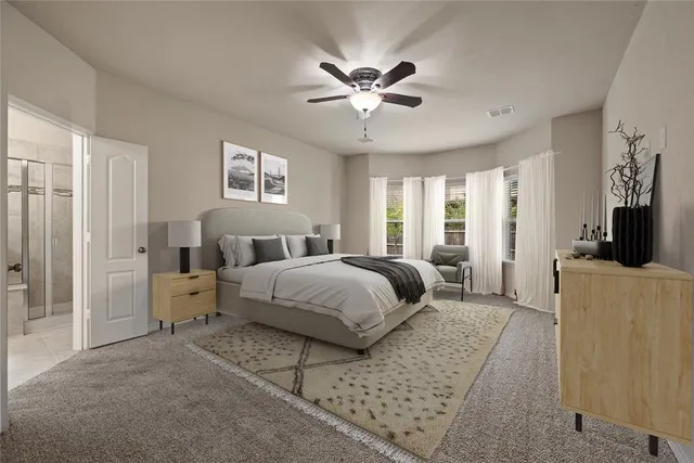 a kitchen with stainless steel appliances granite countertop a refrigerator oven stove a sink a washer and white cabinets with wooden floor