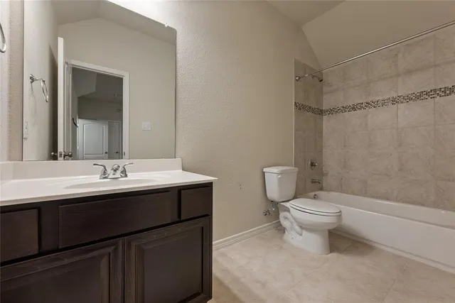 an empty room with windows and entrance