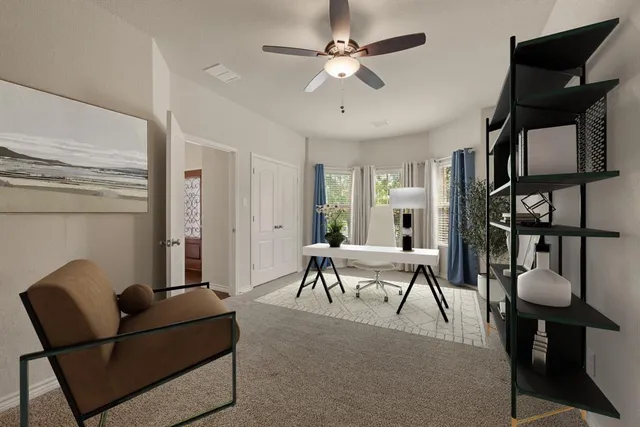 a living room with furniture and a window