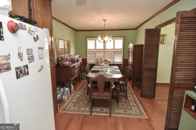 a bathroom with a toilet a sink and shower
