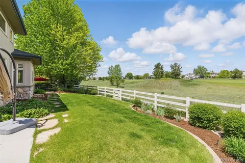 a view of a golf course with a garden