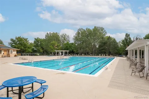 an aerial view of a house with a swimming pool