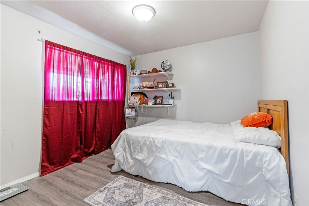 1510 High Street Atwater, CA 95301 - Photo 13 of 27 a bedroom with a bed and a window