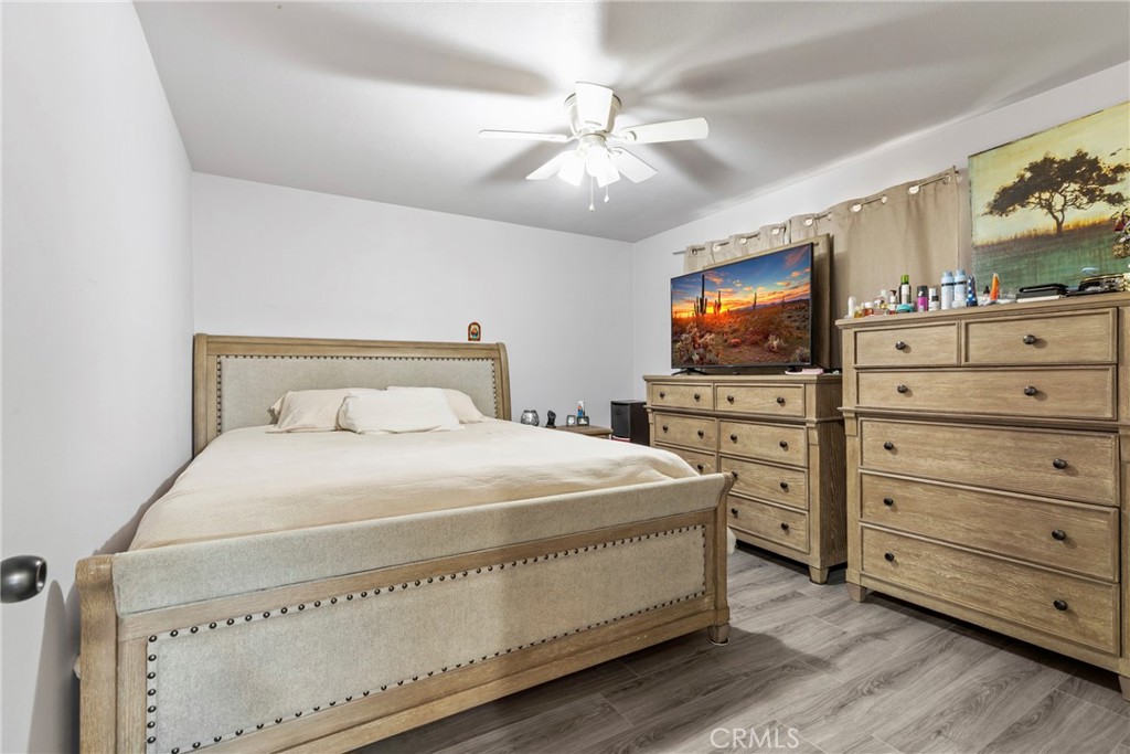 1510 High Street Atwater, CA 95301 - Photo 14 of 27 a bedroom with a bed and a flat screen tv