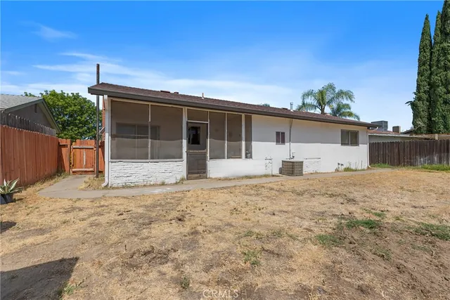 a front view of house with a yard and garage