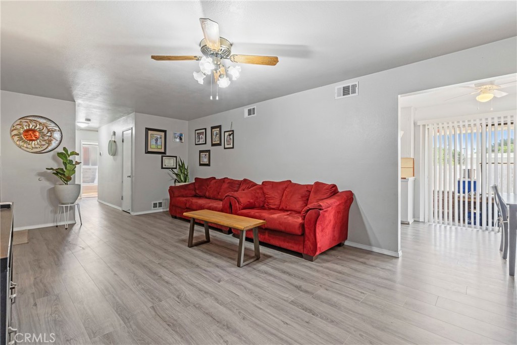 1510 High Street Atwater, CA 95301 - Photo 6 of 27 a living room with furniture and wooden floor