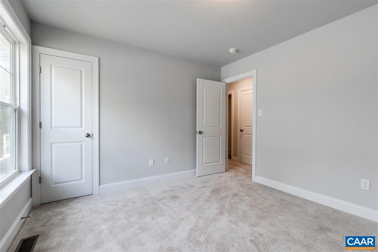2581 Bumpass Road Beaverdam, VA 23015 - Photo 11 of 16 an empty room with windows and closet