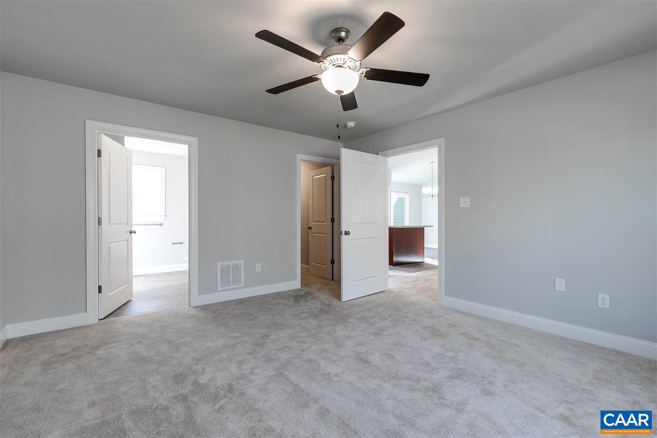 2581 Bumpass Road Beaverdam, VA 23015 - Photo 12 of 16 an empty room that has a large window and kitchen view
