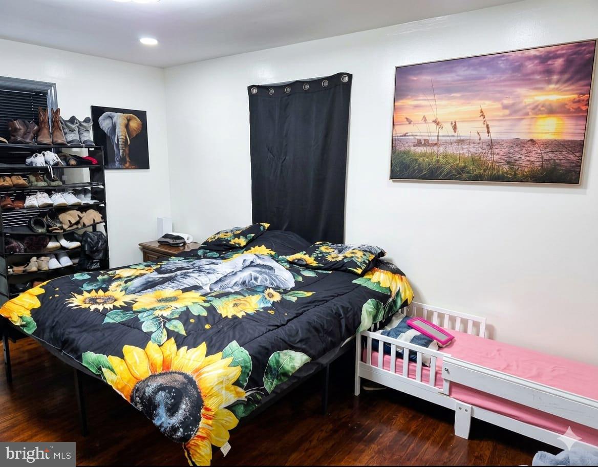 110 High Street Hamilton, NJ 08611 - Photo 14 of 30 a bedroom with bed and a flat screen tv