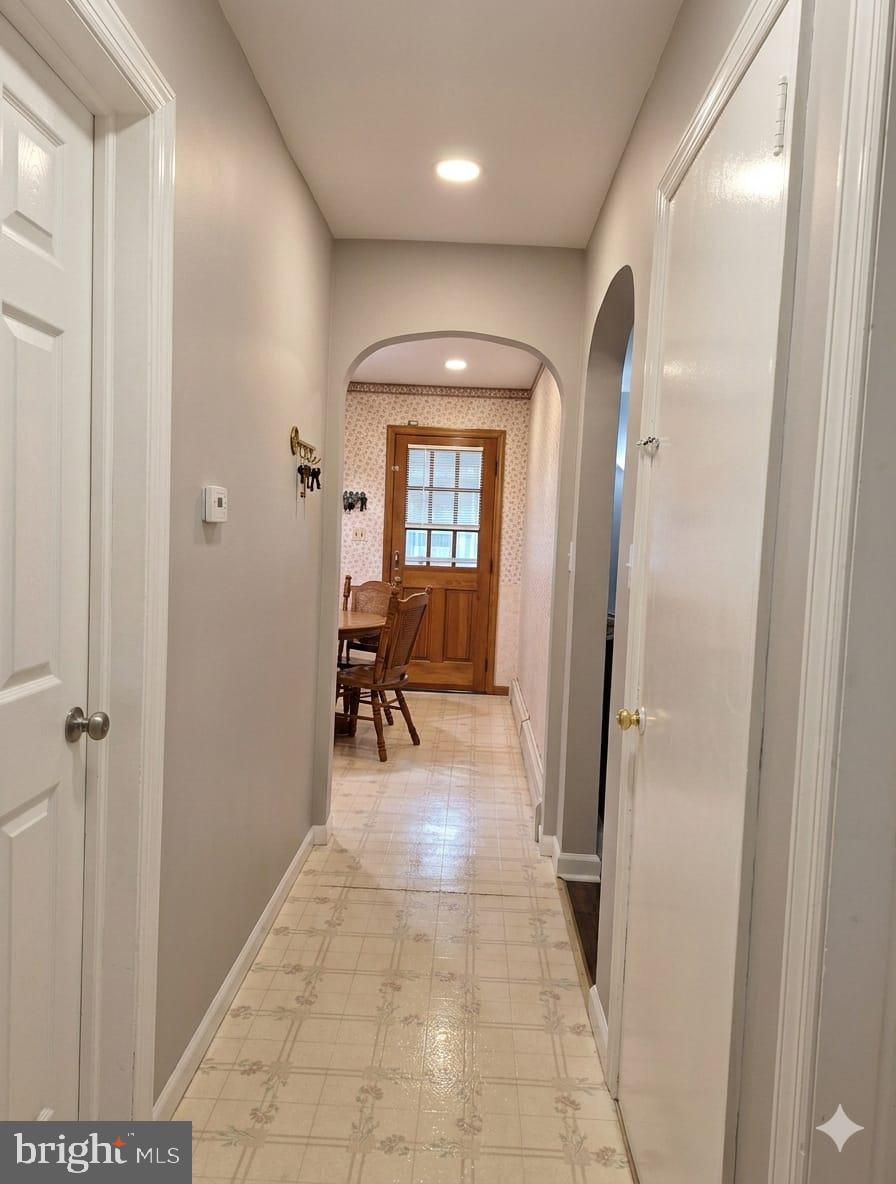 110 High Street Hamilton, NJ 08611 - Photo 16 of 29 a bathroom with a sink and a mirror