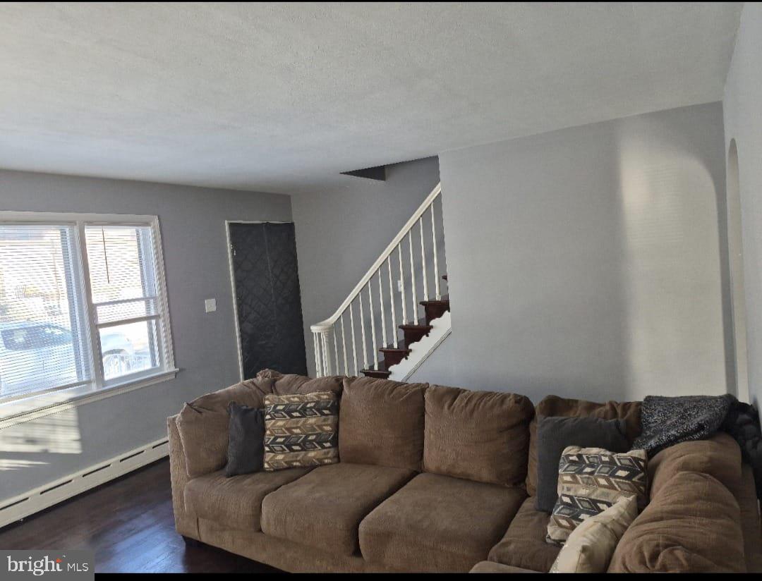 110 High Street Hamilton, NJ 08611 - Photo 19 of 30 a living room with furniture and a window
