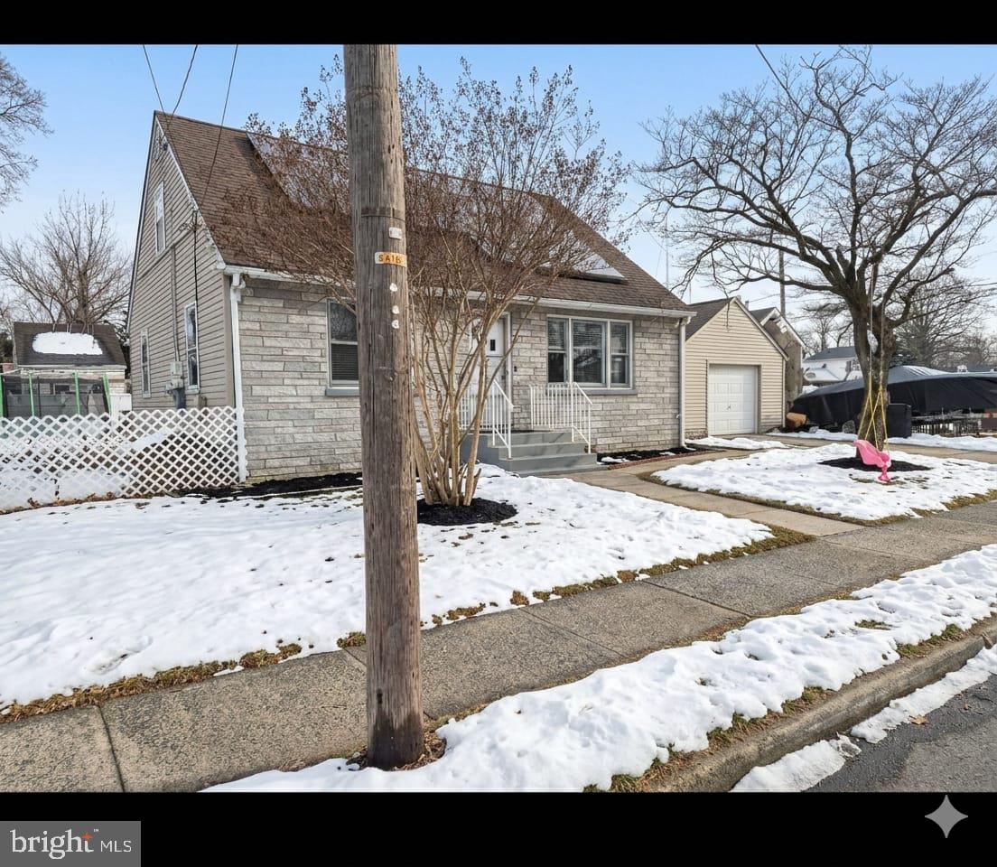 110 High Street Hamilton, NJ 08611 - Photo 2 of 30 a front view of a house with a yard