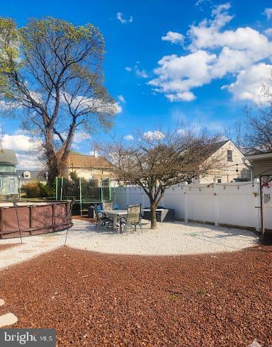 110 High Street Hamilton, NJ 08611 - Photo 4 of 29 a view of outdoor space with trees in the background