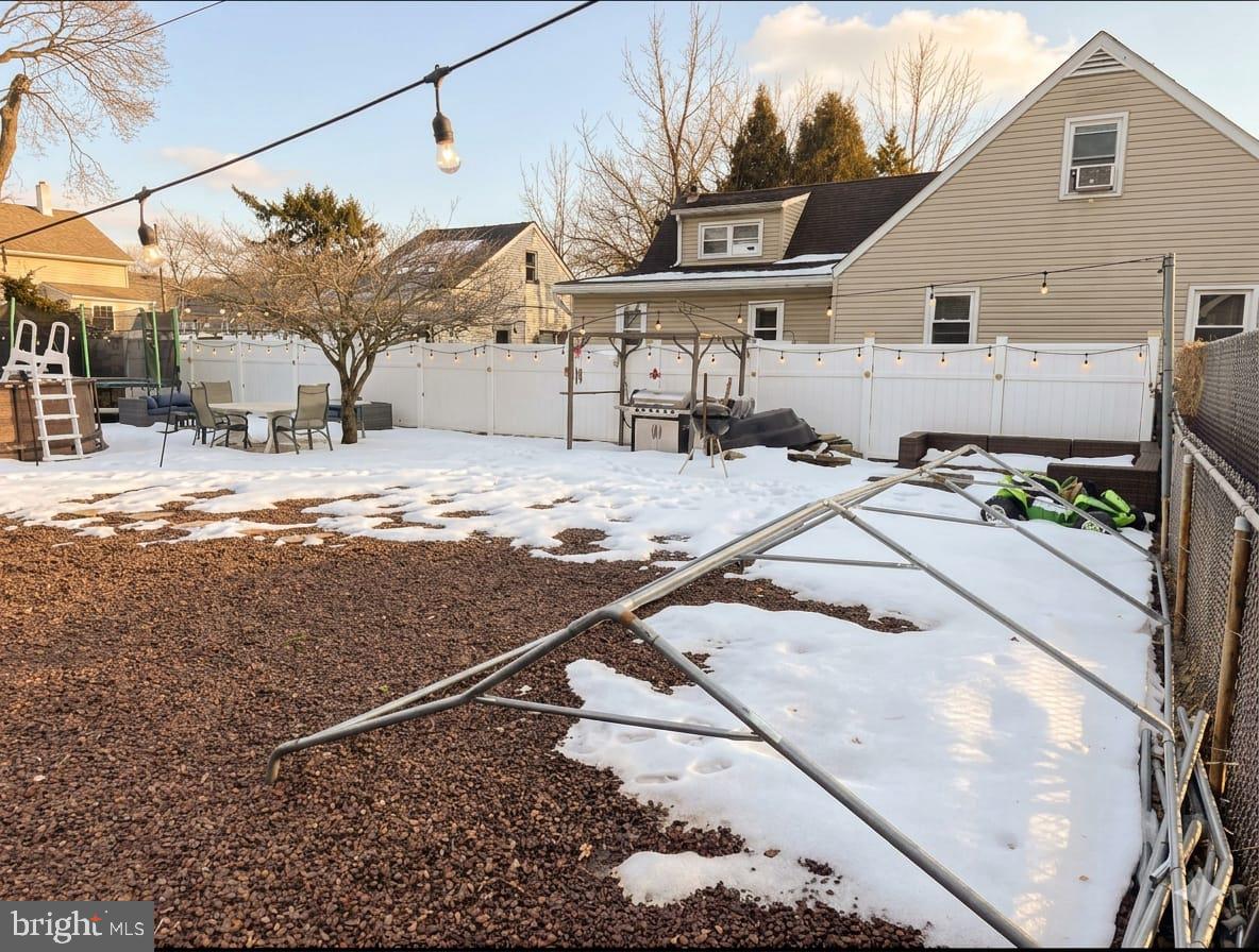 110 High Street Hamilton, NJ 08611 - Photo 5 of 30 a view of a house with snow on the road