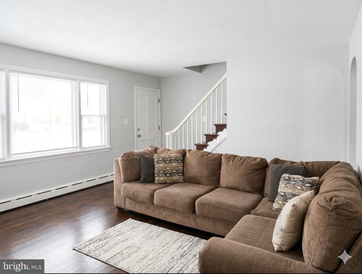 110 High Street Hamilton, NJ 08611 - Photo 8 of 29 a living room with furniture and a window