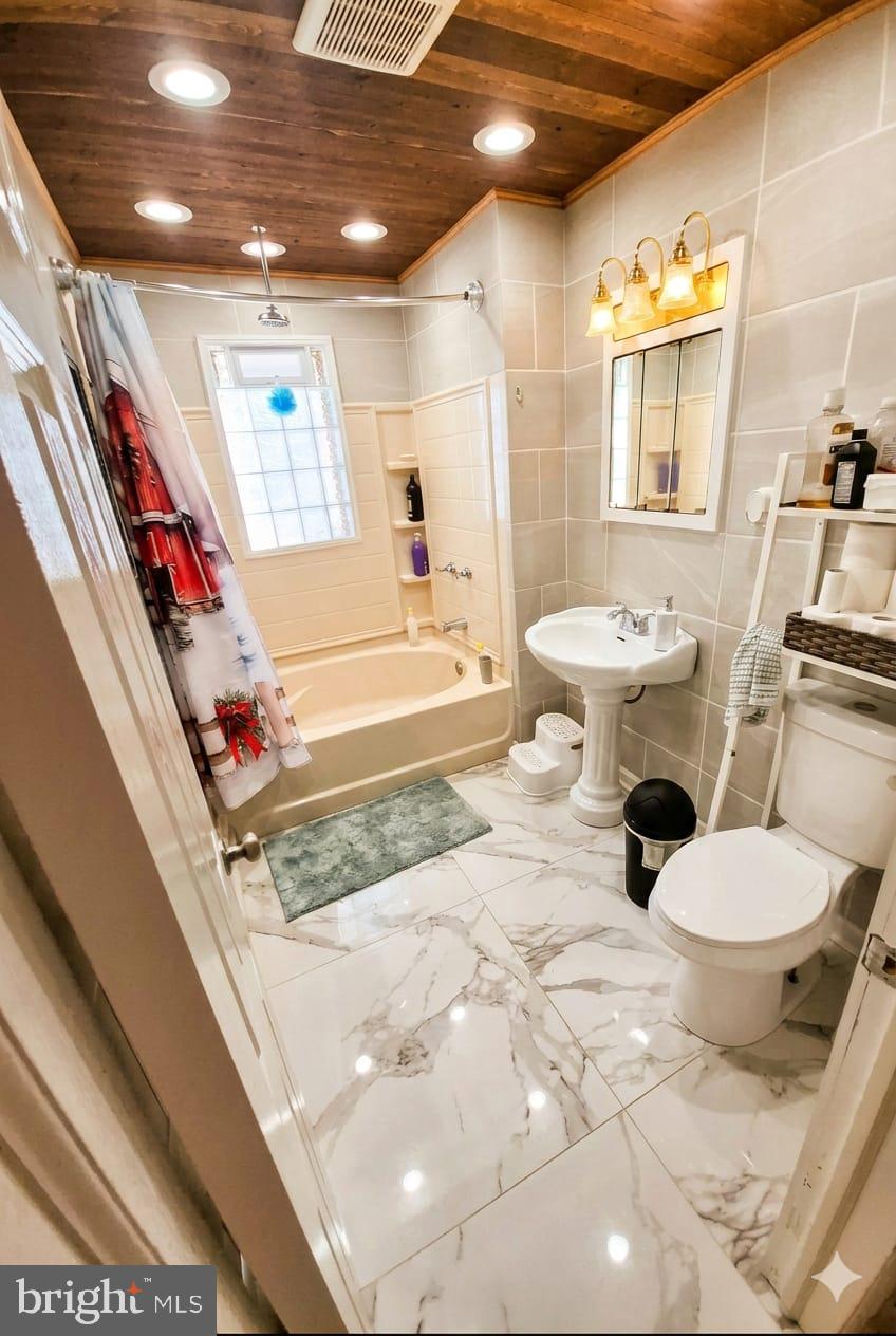 110 High Street Hamilton, NJ 08611 - Photo 10 of 29 a bathroom with a sink toilet and shower