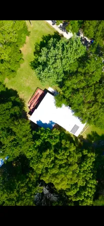 a view of livingroom with window and hardwood floor