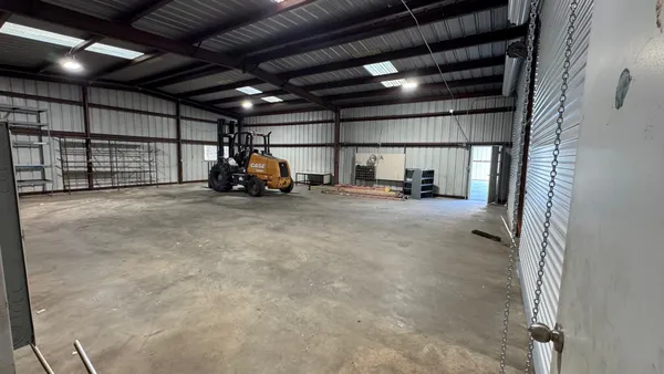 a view of room with gym equipment