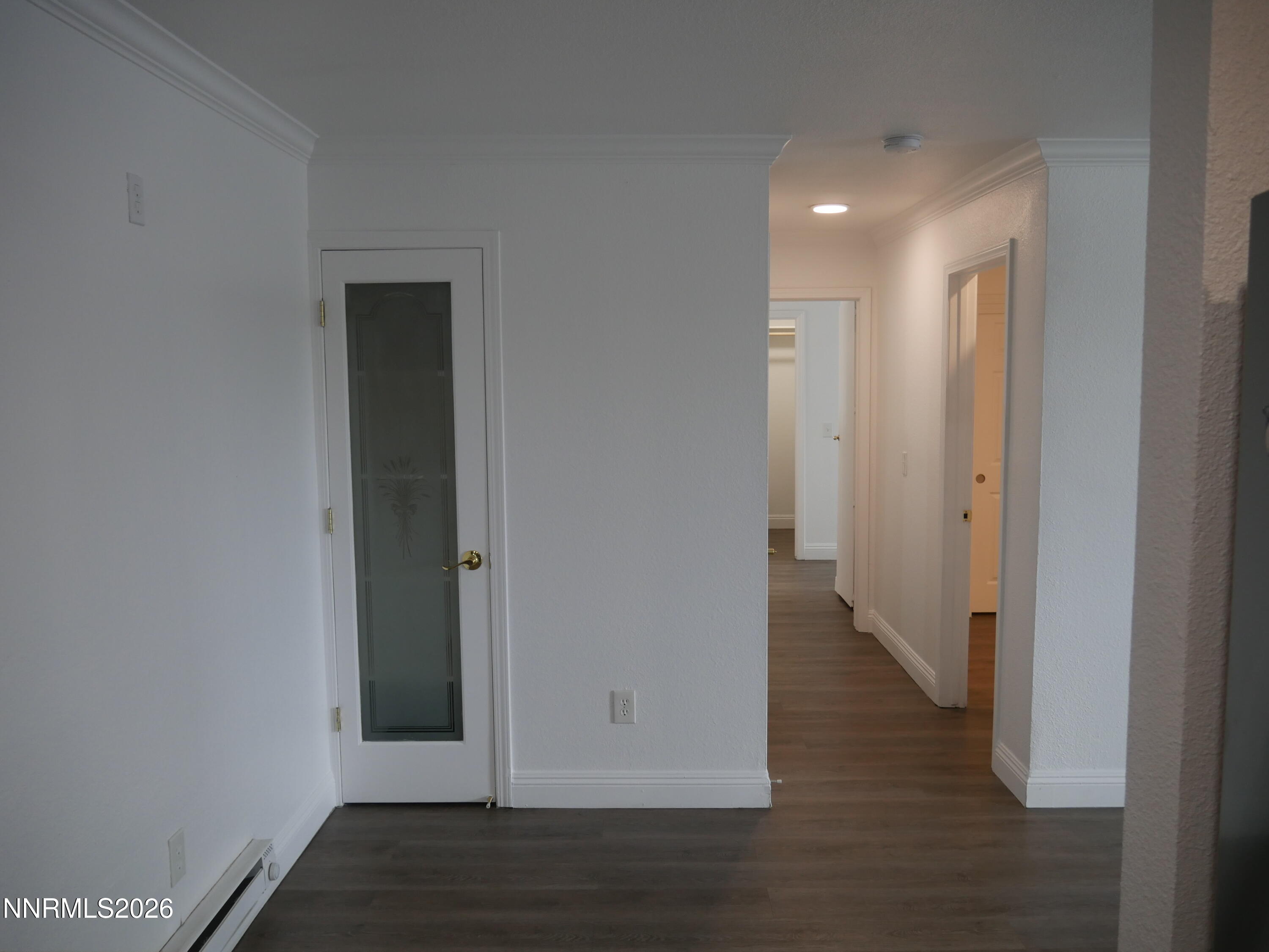 2385 Tripp Drive, Unit 3 Reno, NV 89512 - Photo 11 of 49 a view of a hallway with wooden floor