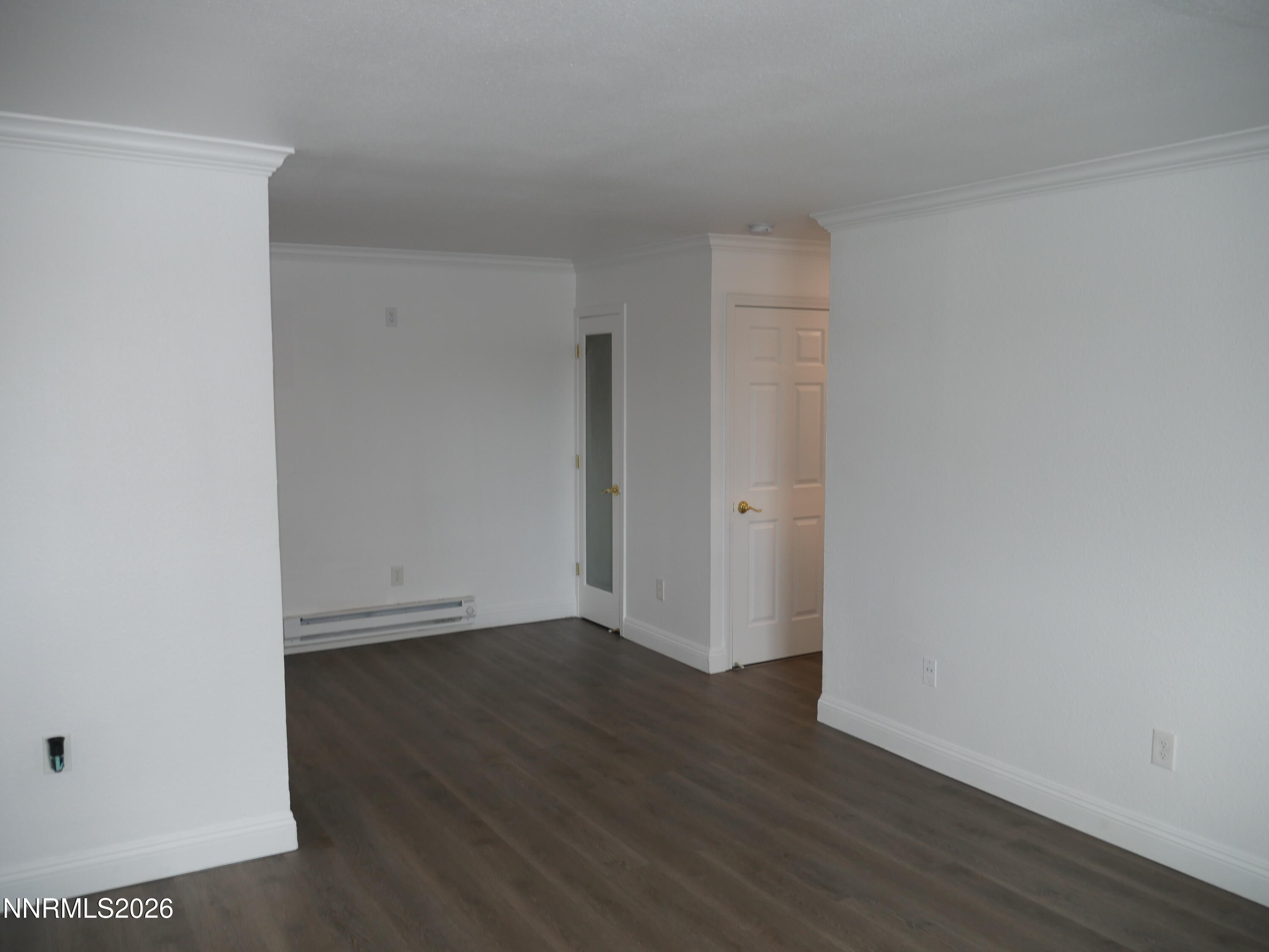 2385 Tripp Drive, Unit 3 Reno, NV 89512 - Photo 12 of 49 a view of an empty room with wooden floor