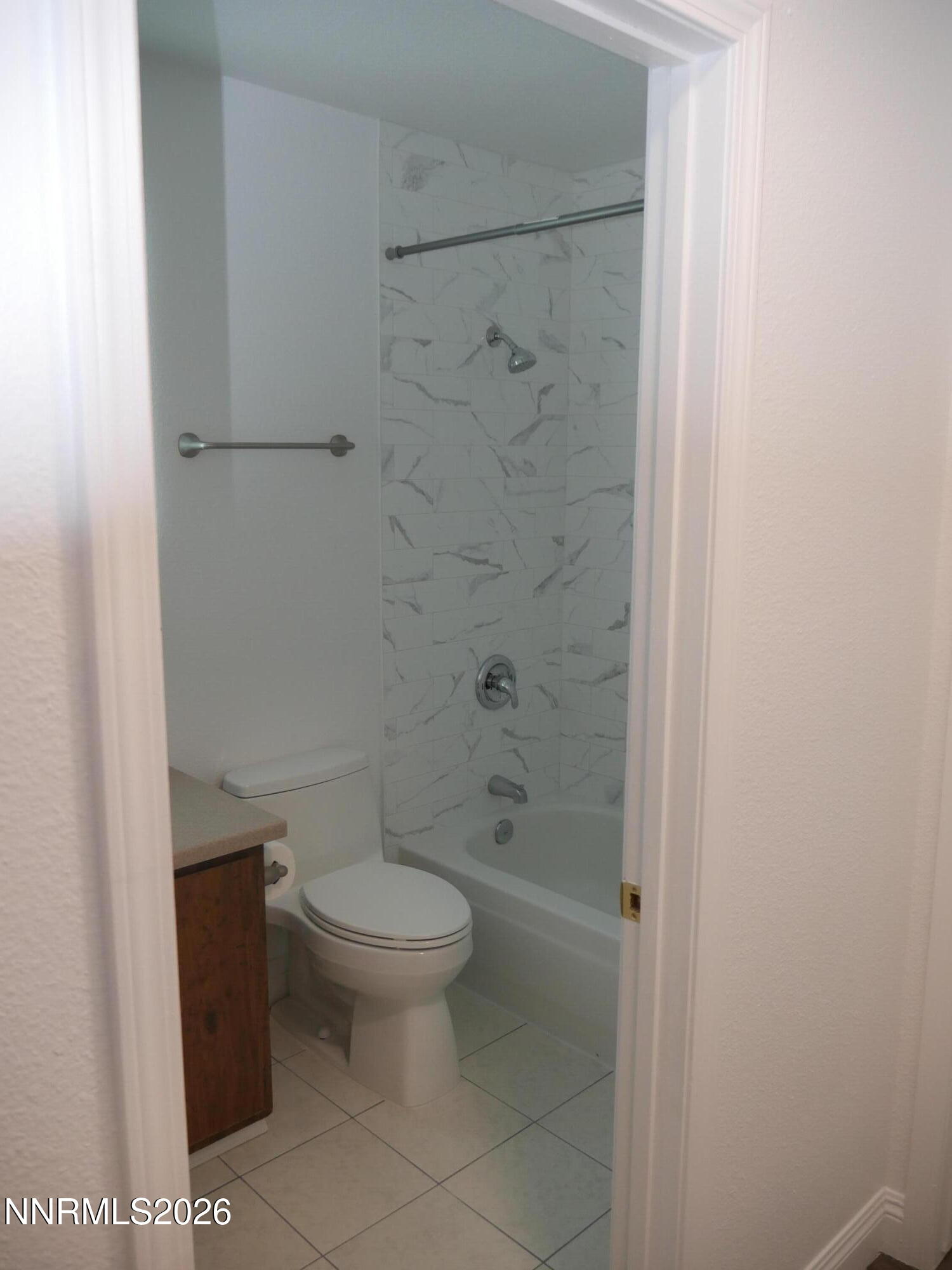 2385 Tripp Drive, Unit 3 Reno, NV 89512 - Photo 31 of 49 a white toilet sitting next to a shower