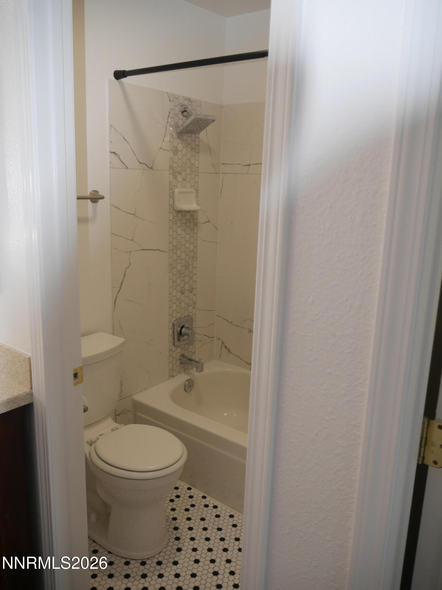 2385 Tripp Drive, Unit 3 Reno, NV 89512 - Photo 36 of 49 a bathroom with a toilet a sink and shower