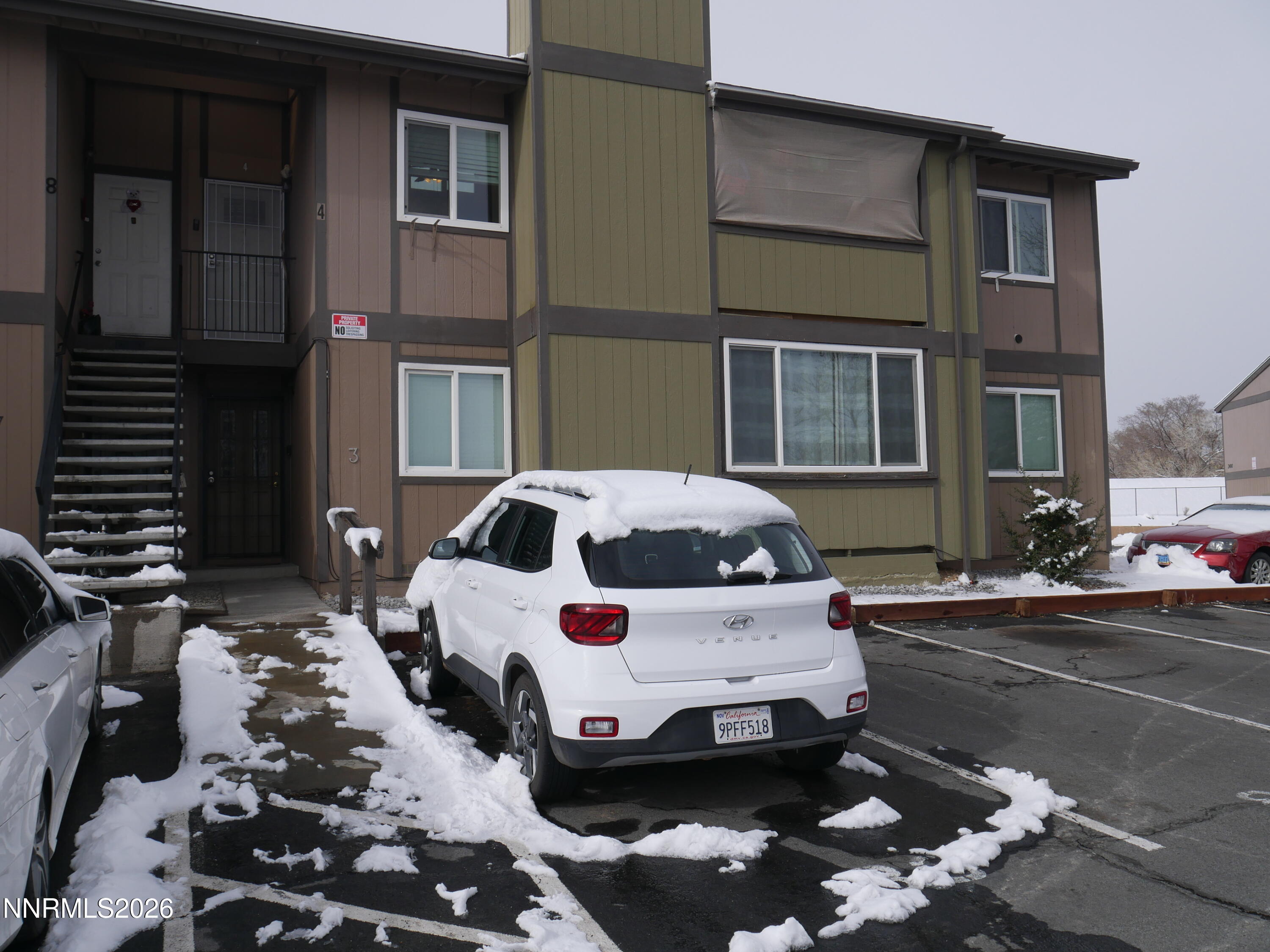 2385 Tripp Drive, Unit 3 Reno, NV 89512 - Photo 4 of 49 a white car parked in front of a building