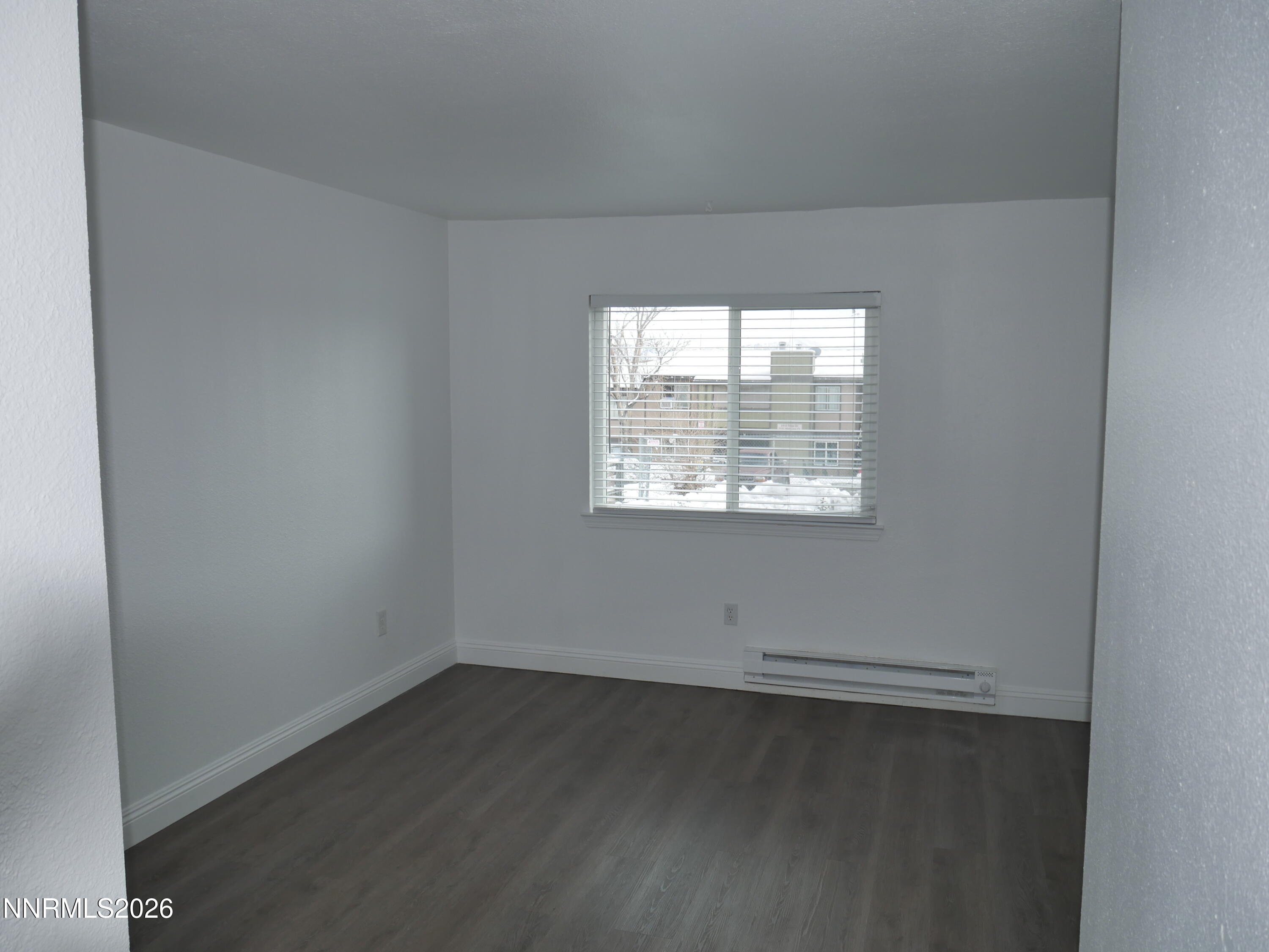 2385 Tripp Drive, Unit 3 Reno, NV 89512 - Photo 41 of 49 an empty room with a window