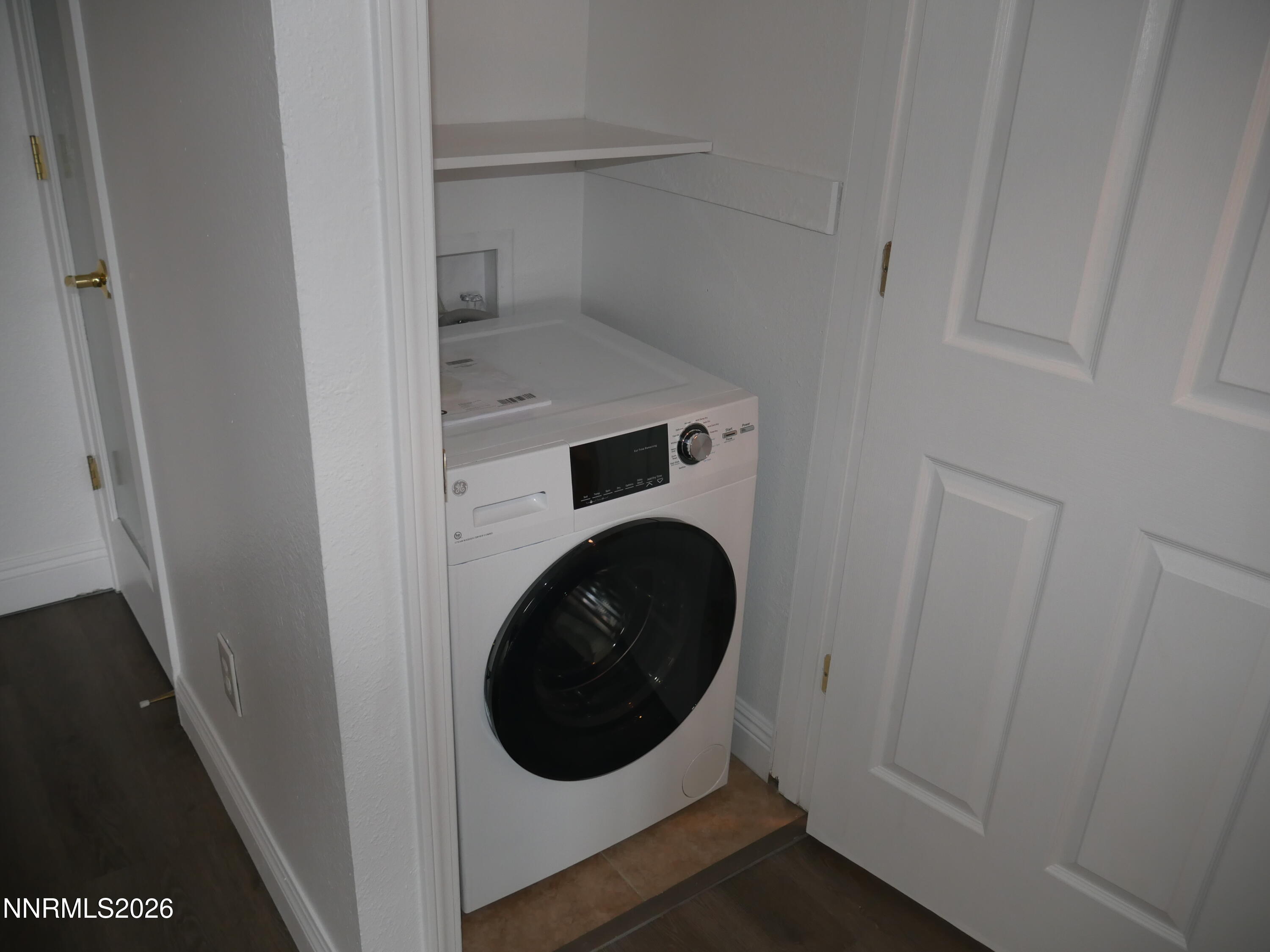 2385 Tripp Drive, Unit 3 Reno, NV 89512 - Photo 45 of 49 a utility room with washing machine