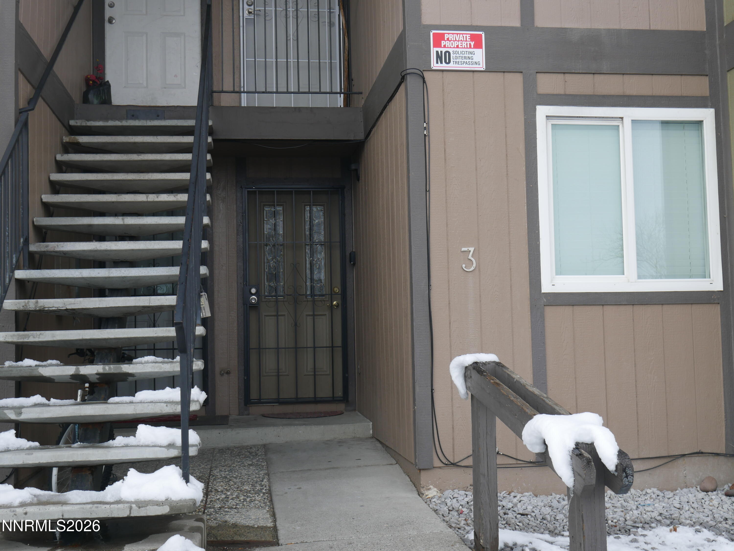 2385 Tripp Drive, Unit 3 Reno, NV 89512 - Photo 7 of 49 a front view of a house with entryway