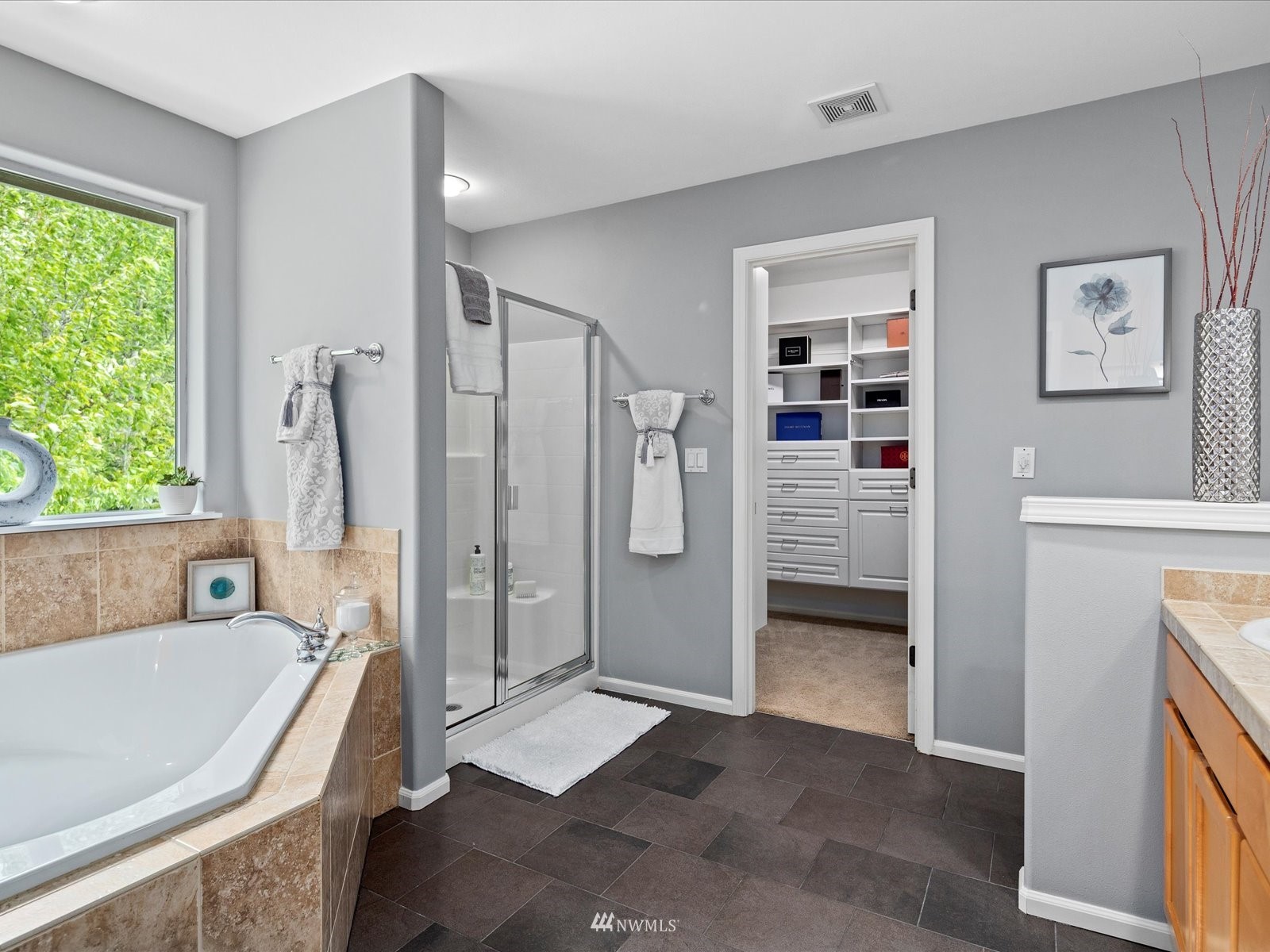 1705 235th Place Southwest Bothell, WA 98021 - Photo 20 of 35 a bathroom with a tub sink and shower