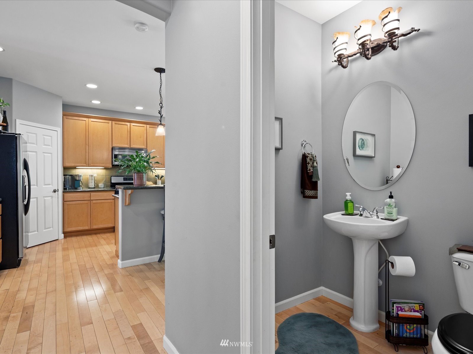 1705 235th Place Southwest Bothell, WA 98021 - Photo 24 of 35 a room with kitchen island a table and chairs