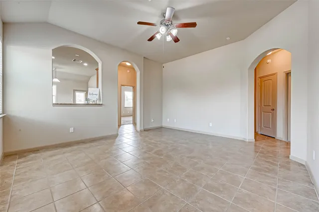 wooden floor in a room with a bathroom