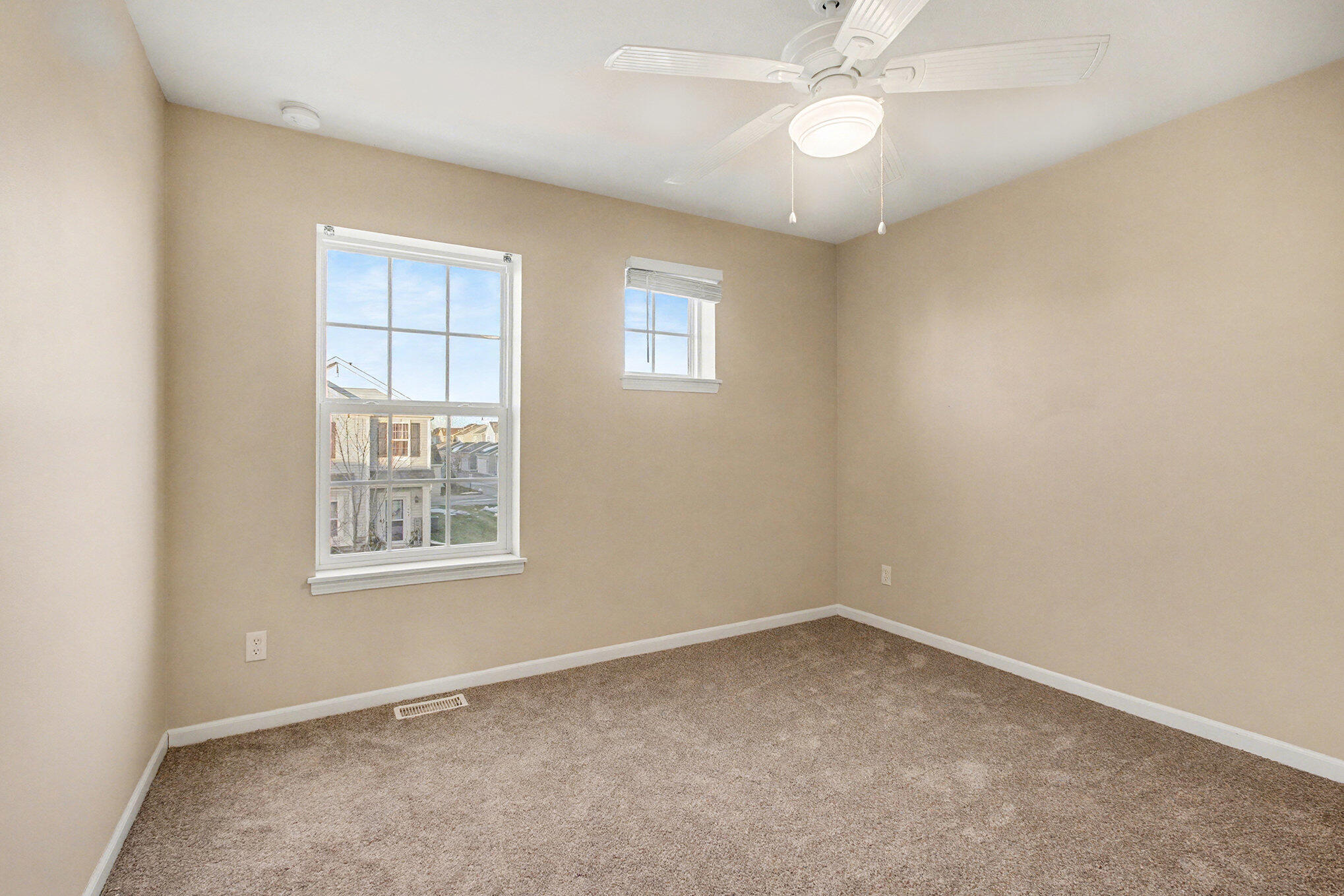 1063 East 116th Place Crown Point, IN 46307 - Photo 20 of 24 an empty room with a window and closet area