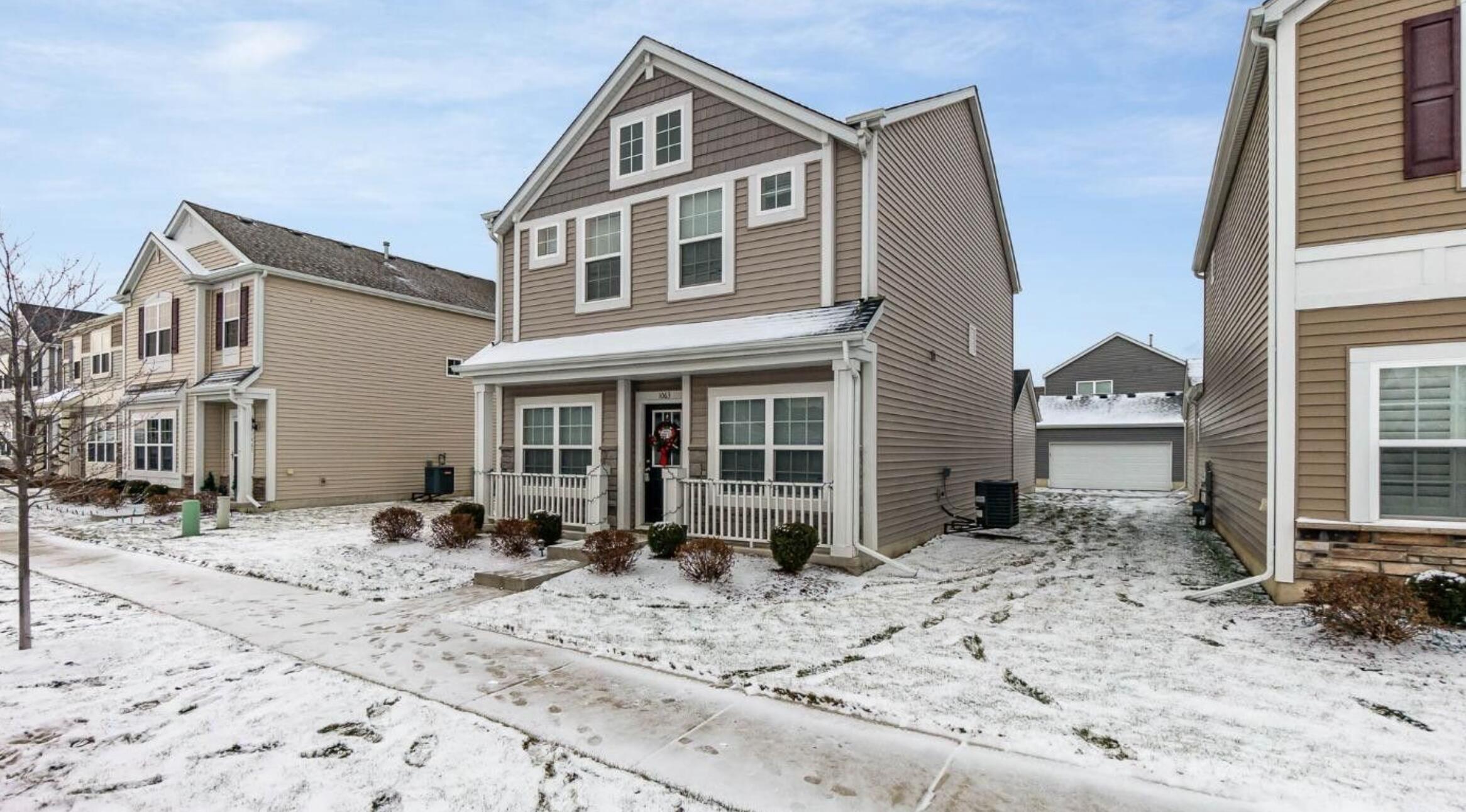 1063 East 116th Place Crown Point, IN 46307 - Photo 3 of 24 a front view of a house with a yard outdoor seating