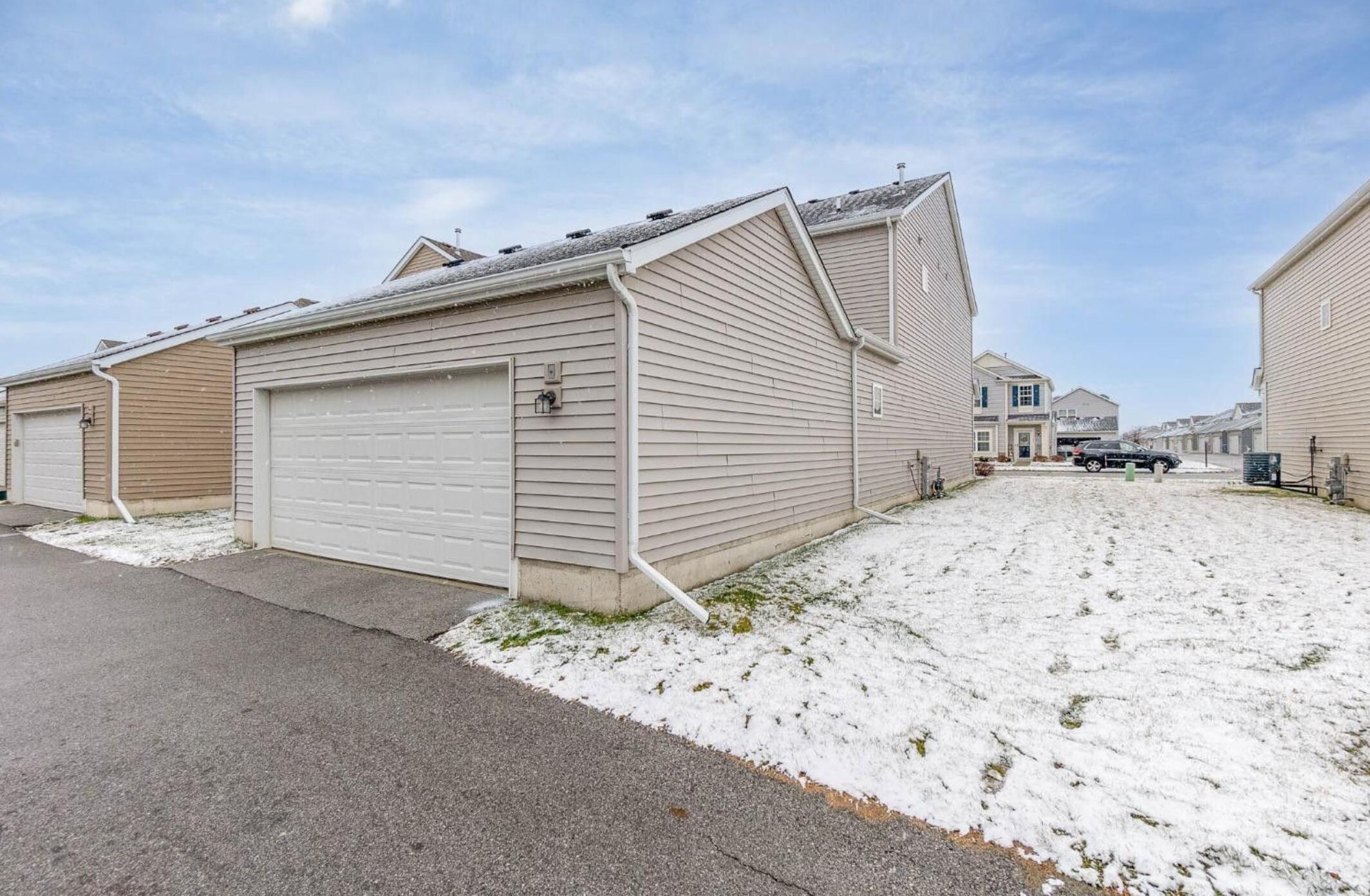 1063 East 116th Place Crown Point, IN 46307 - Photo 4 of 24 a view of garage and yard