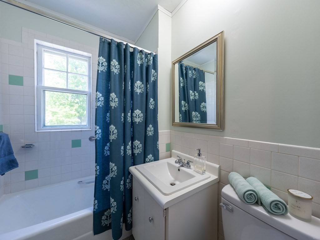 82 Oak Street Lexington, MA 02421 - Photo 18 of 31 a bathroom with a sink toilet and shower