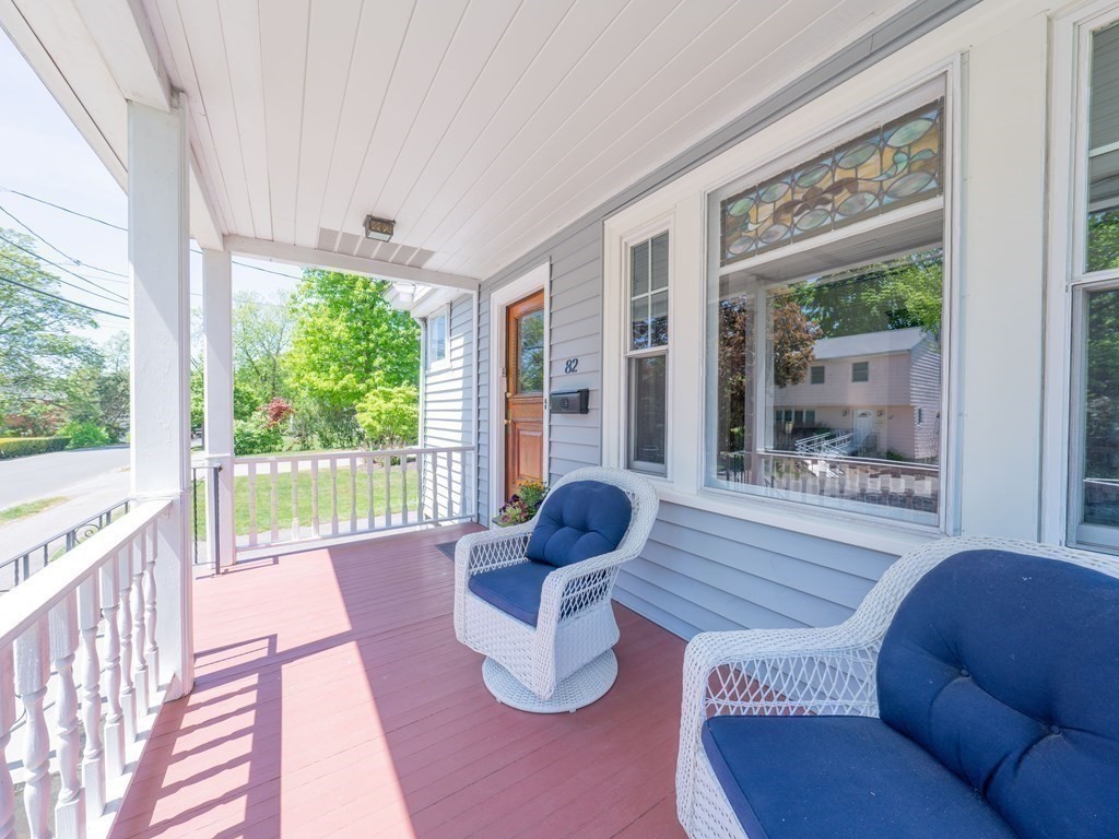82 Oak Street Lexington, MA 02421 - Photo 2 of 31 a living room with furniture and a large window