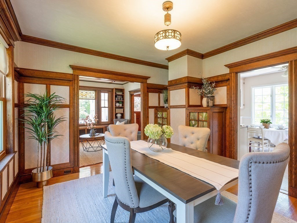 82 Oak Street Lexington, MA 02421 - Photo 6 of 31 a dining room with furniture wooden floor and a chandelier