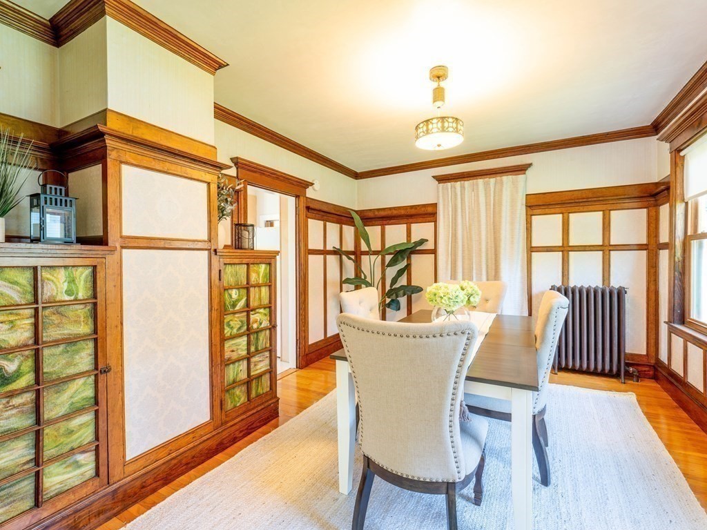 82 Oak Street Lexington, MA 02421 - Photo 8 of 31 a view of a dining room with furniture a chandelier and wooden floor