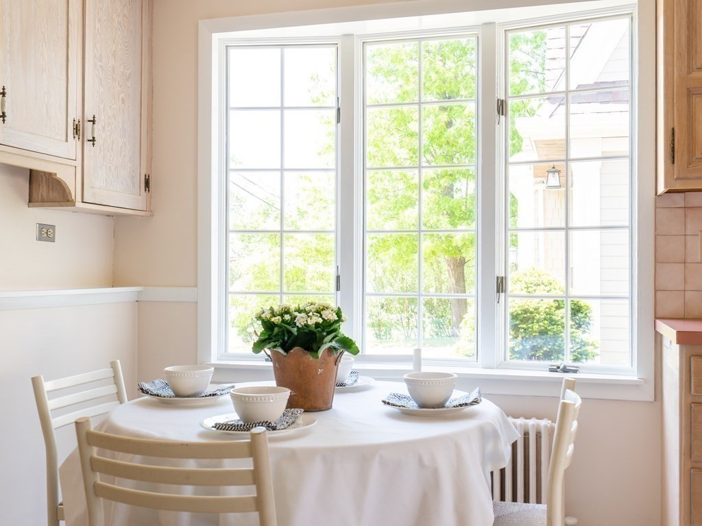 82 Oak Street Lexington, MA 02421 - Photo 10 of 31 a dining room with a window and furniture