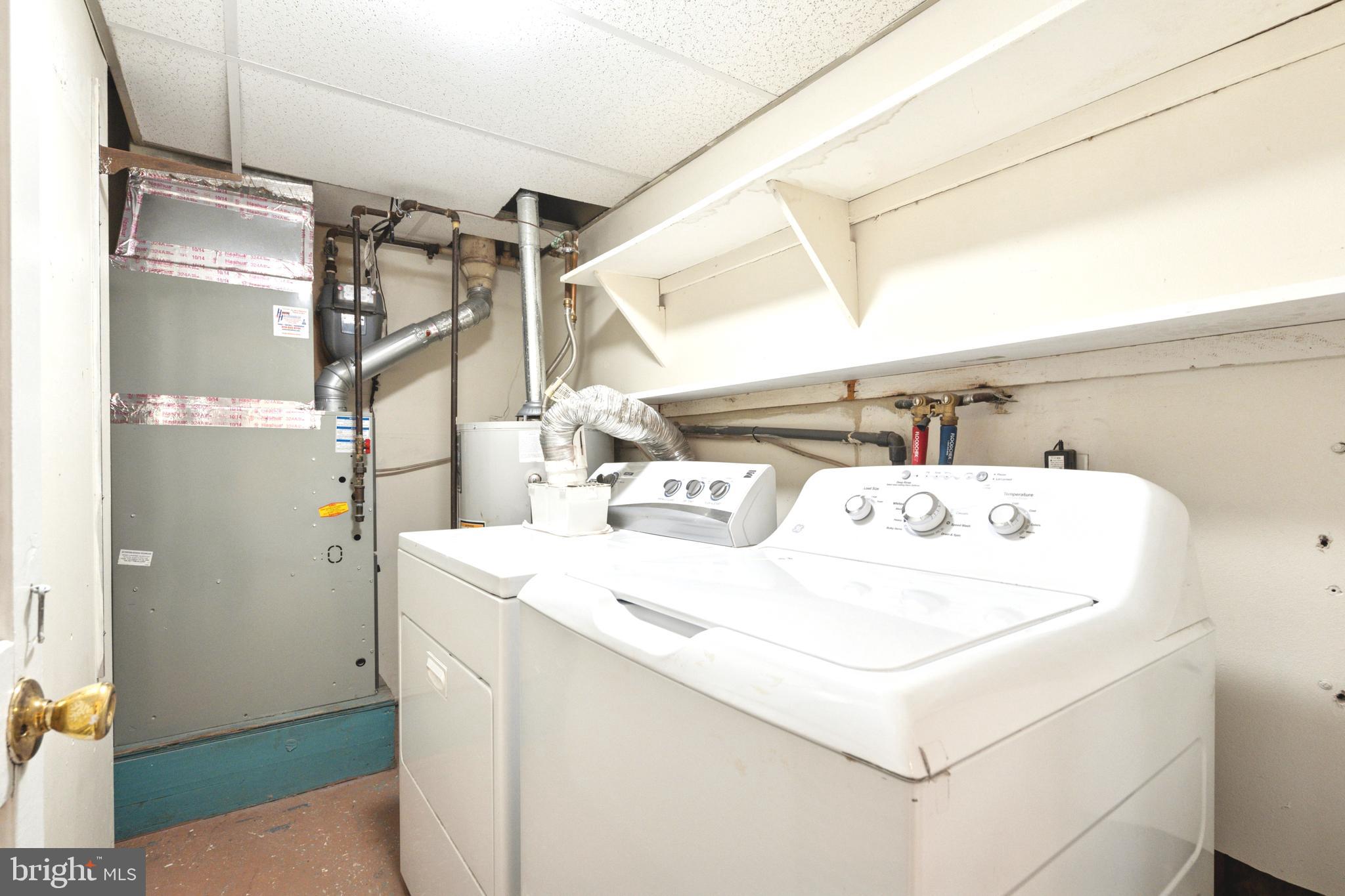 700 Ardmore Avenue, Unit 621 Ardmore, PA 19003 - Photo 12 of 37 a utility room with washer and dryer