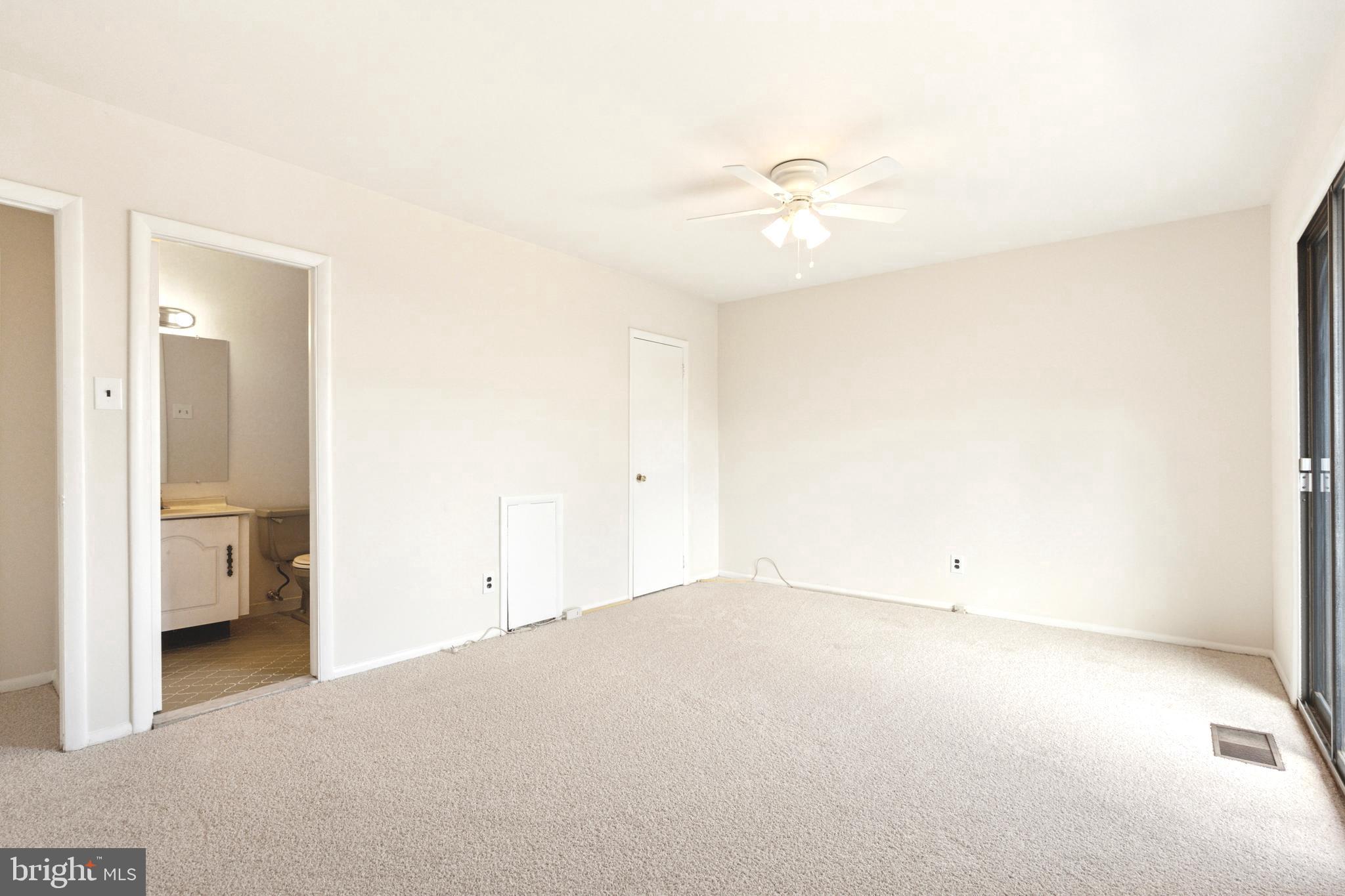 700 Ardmore Avenue, Unit 621 Ardmore, PA 19003 - Photo 16 of 37 a view of a room with cabinet and a ceiling fan