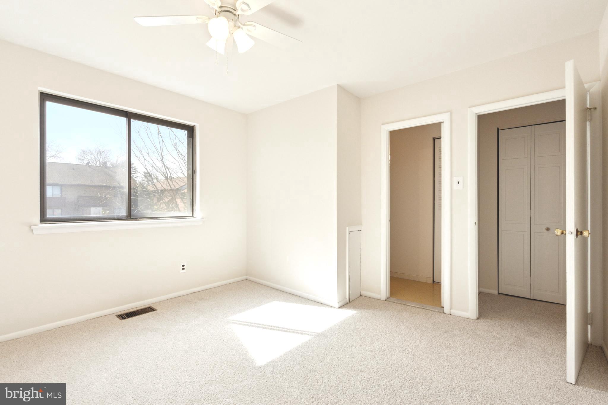 700 Ardmore Avenue, Unit 621 Ardmore, PA 19003 - Photo 24 of 37 an empty room with windows and closet