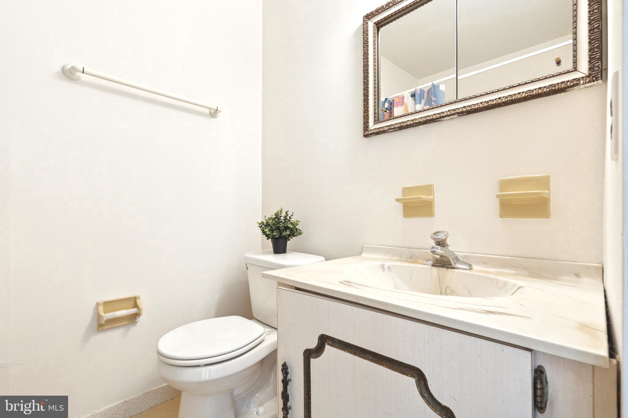 700 Ardmore Avenue, Unit 621 Ardmore, PA 19003 - Photo 25 of 37 a bathroom with a sink and a toilet