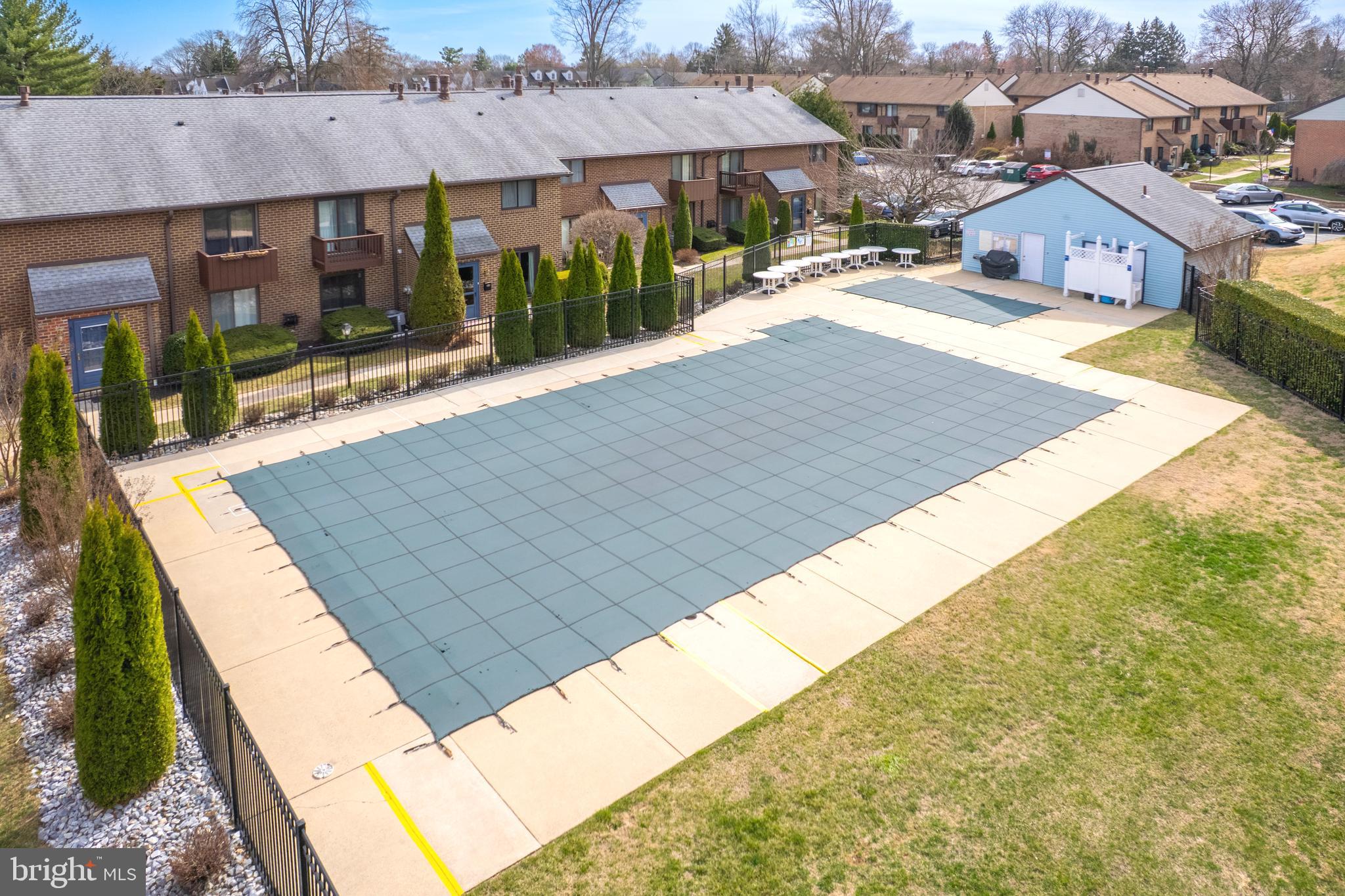 700 Ardmore Avenue, Unit 621 Ardmore, PA 19003 - Photo 37 of 37 a view of a patio with a table and chairs